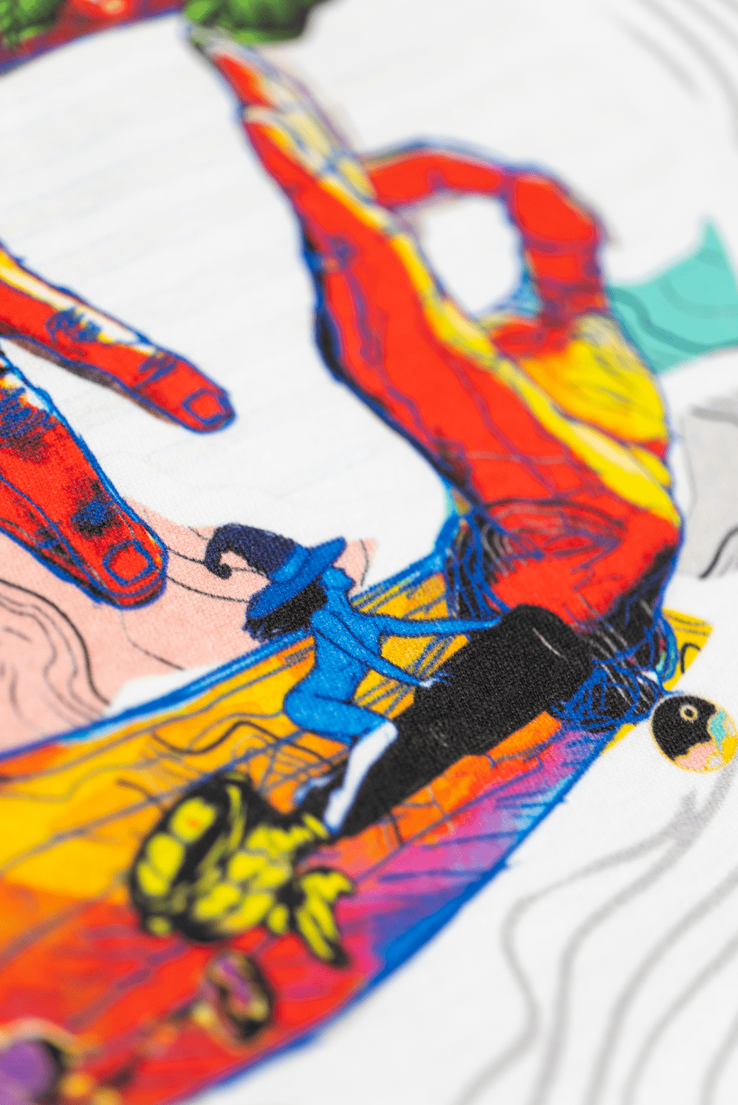 Close up of one of the hands on the back print of the white Missing bean X Brian Gray T-Shirt, the back print depicts two hands spelling out MB which are detailed with a range of clever, original, sketches to signify the journey of a coffee bean.