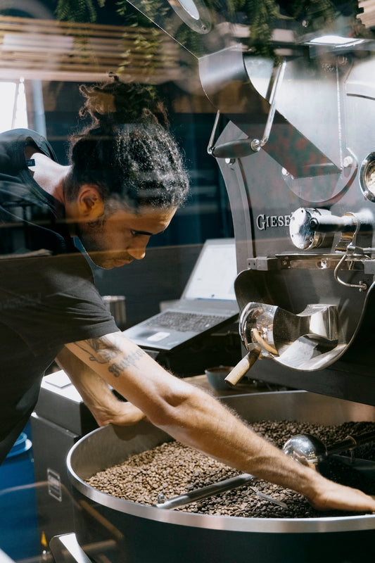 Missing Bean's coffee roaster freshly roasting coffee beans using a Giensen coffee roaster.