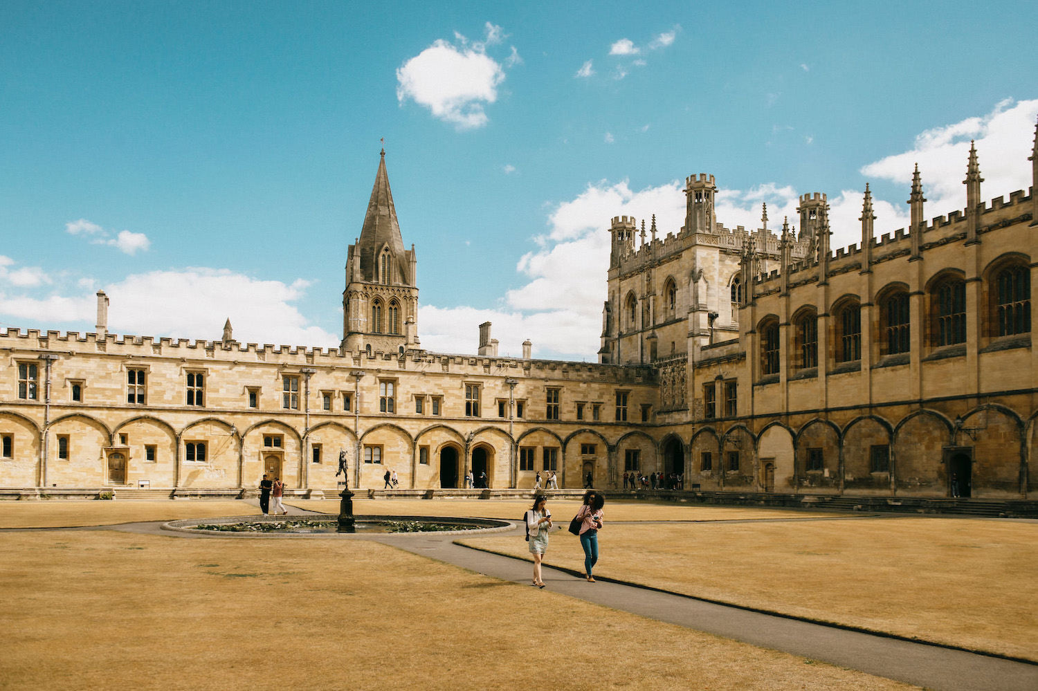 Students walking through an Oxford college quad, where Missing Bean wholesale coffee is served